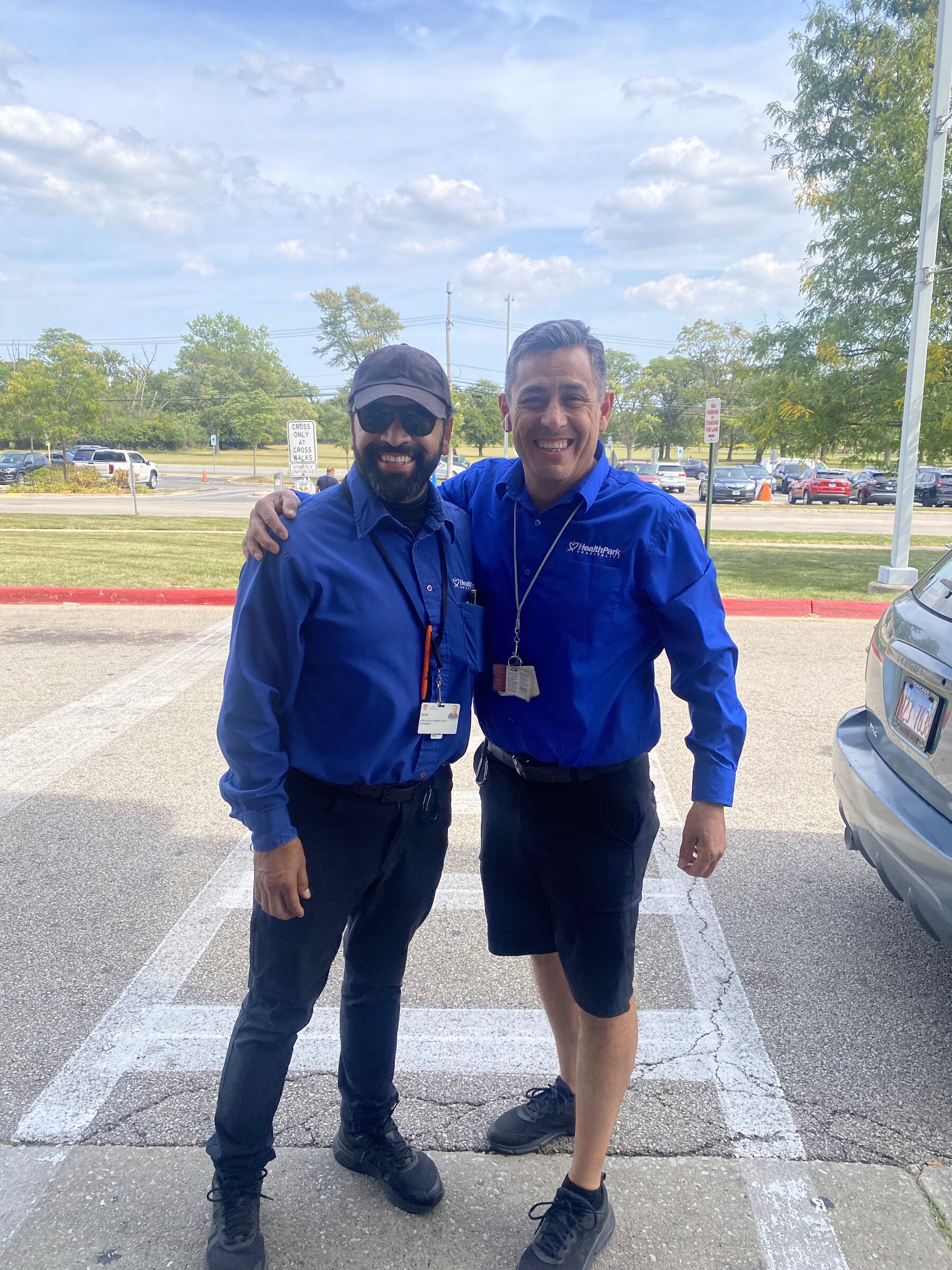HealthPark traffic control team members in a hospital parking area