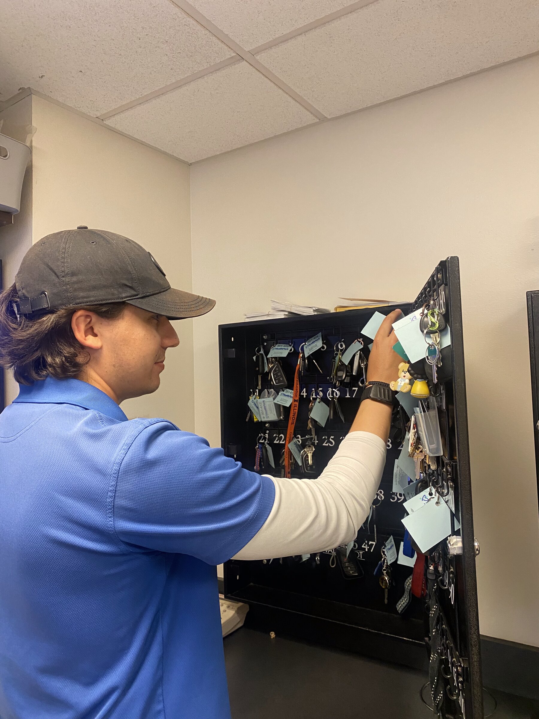 HealthPark team members reviewing operations on a handheld device